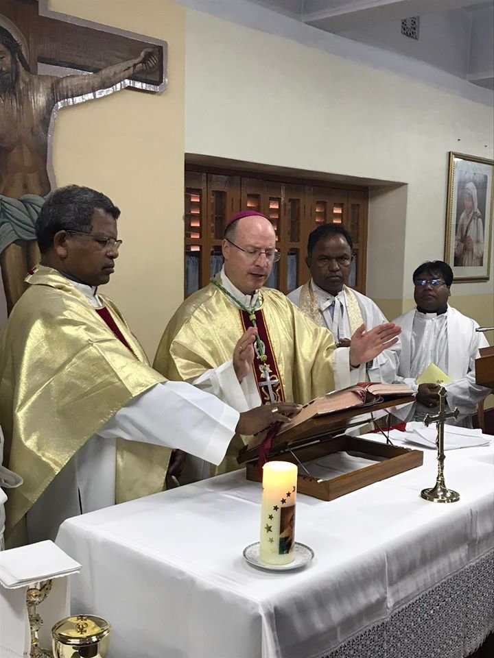 Bishop McKnight and Bishop Kerketta offer Mass near the tomb of St. Teresa of Kolkata.